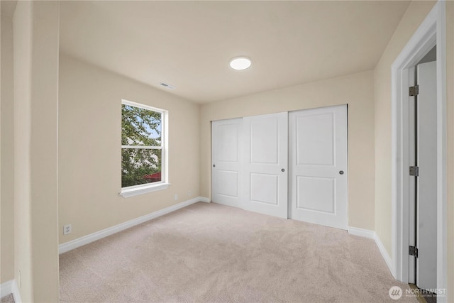 12570 SE 295th St, Auburn, WA 98092 - unfurnished bedroom with carpet, baseboards, and a closet