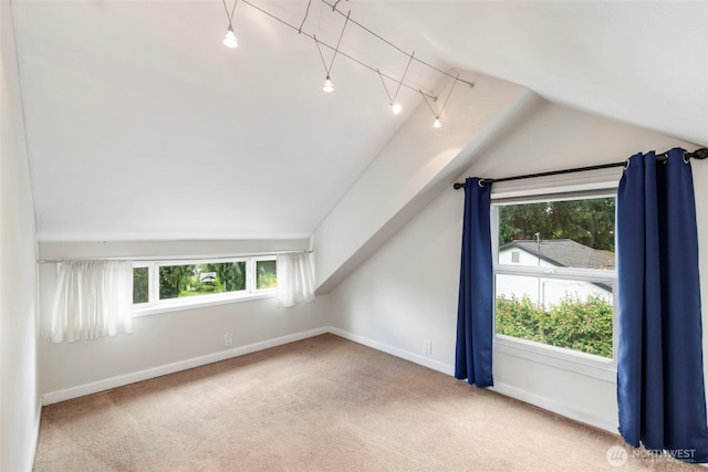 2016 Marine Dr, Bremerton, WA 98312 - additional living space featuring lofted ceiling, plenty of natural light, carpet, and baseboards