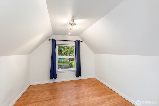 2016 Marine Dr, Bremerton, WA 98312 - bonus room featuring vaulted ceiling, wood finished floors, and baseboards