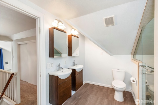 2016 Marine Dr, Bremerton, WA 98312 - bathroom with toilet, lofted ceiling, vanity, an enclosed shower, and baseboards