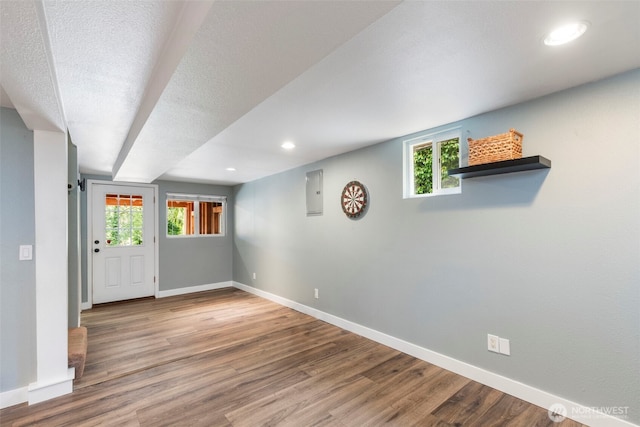 2016 Marine Dr, Bremerton, WA 98312 - below grade area with baseboards, wood finished floors, and recessed lighting