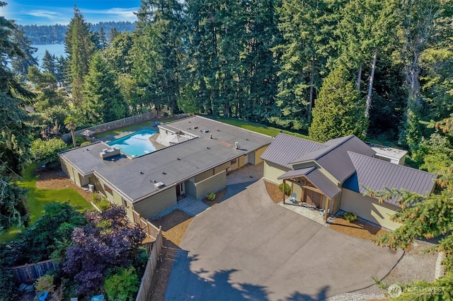 6324 NE 130th Pl, Kirkland, WA 98034 - view of subject property featuring a pool area and a heavily wooded area