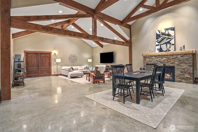 6324 NE 130th Pl, Kirkland, WA 98034 - dining area with finished concrete flooring, recessed lighting, and a stone fireplace