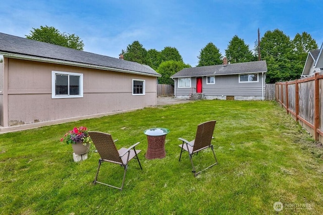 view of yard featuring entry steps