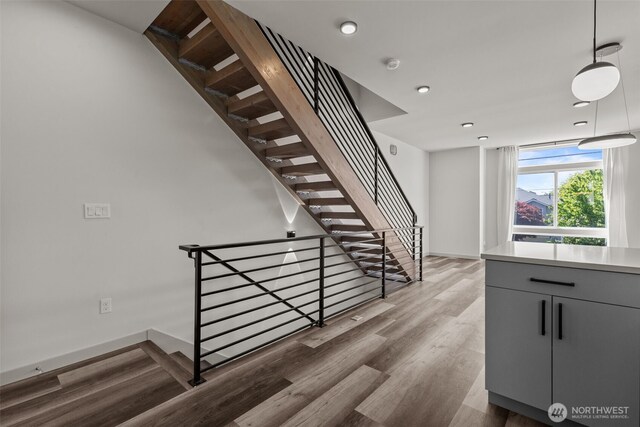 2422C NW 60th St, Seattle, WA 98107 - stairway with wood finished floors, recessed lighting, and baseboards