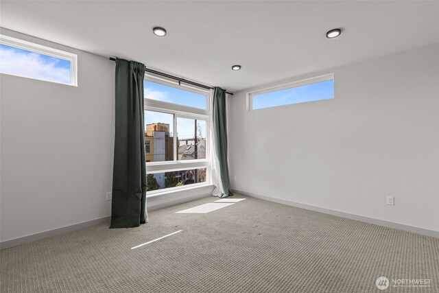 2422C NW 60th St, Seattle, WA 98107 - carpeted empty room featuring baseboards and recessed lighting
