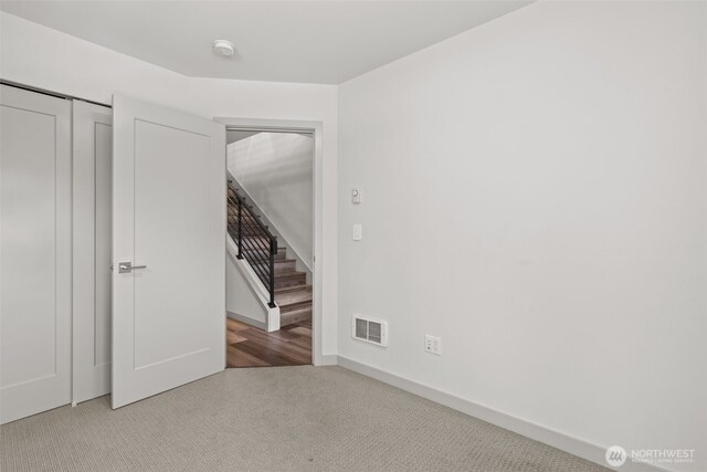 2422C NW 60th St, Seattle, WA 98107 - unfurnished bedroom with carpet floors and baseboards