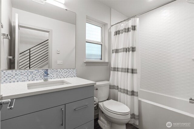 2422C NW 60th St, Seattle, WA 98107 - full bath featuring toilet, tasteful backsplash, vanity, and shower / bath combination with curtain