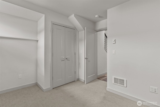 2422C NW 60th St, Seattle, WA 98107 - unfurnished bedroom with carpet floors, baseboards, and a closet