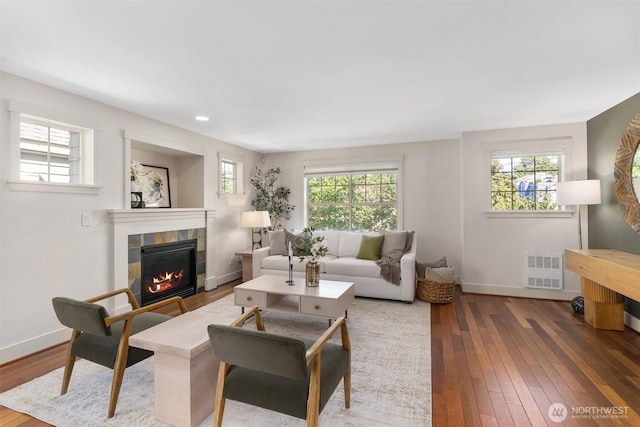 403 21st Ave, Seattle, WA 98122 - living room featuring a fireplace, baseboards, hardwood / wood-style floors, and recessed lighting