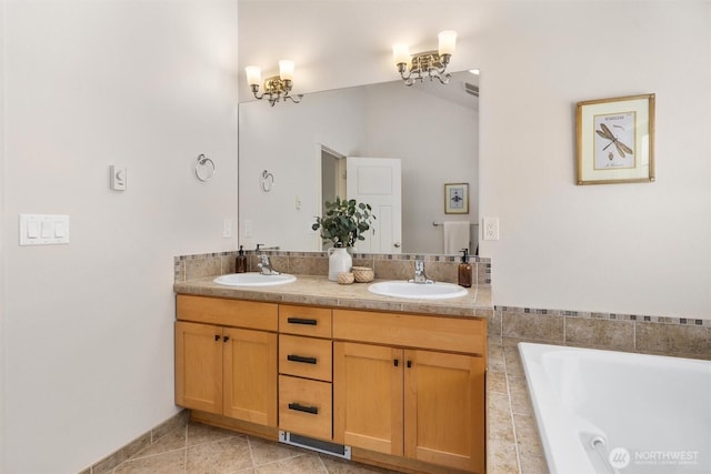 403 21st Ave, Seattle, WA 98122 - bathroom featuring double vanity, a whirlpool tub, lofted ceiling, and tile patterned floors