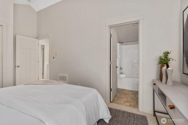 403 21st Ave, Seattle, WA 98122 - bedroom with light carpet and vaulted ceiling