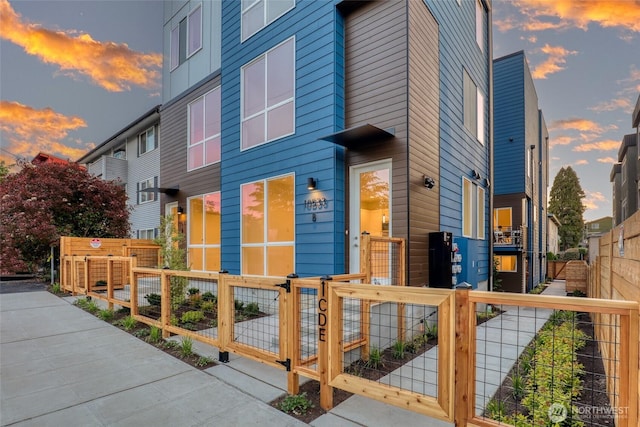 view of front of house with a gate and a fenced front yard