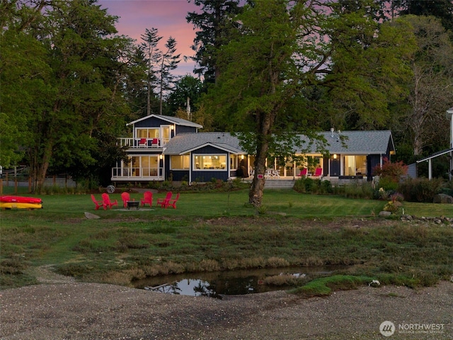 4354 Dyes Inlet Rd NW, Bremerton, WA 98312 - view of front of home with a balcony and a yard
