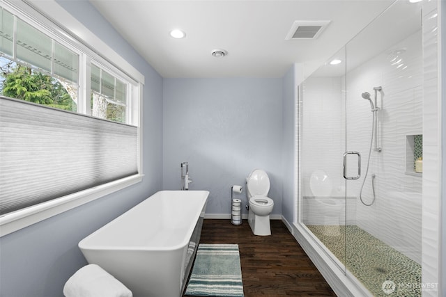 4354 Dyes Inlet Rd NW, Bremerton, WA 98312 - full bath featuring toilet, wood finished floors, a stall shower, a soaking tub, and recessed lighting