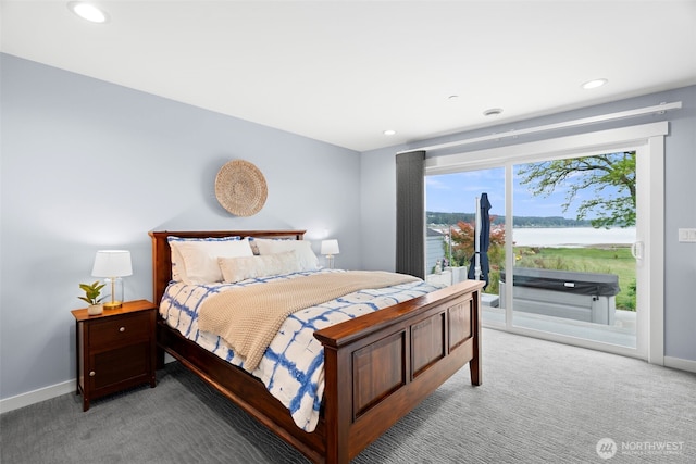 4354 Dyes Inlet Rd NW, Bremerton, WA 98312 - bedroom featuring access to exterior, light colored carpet, baseboards, recessed lighting, and a water view