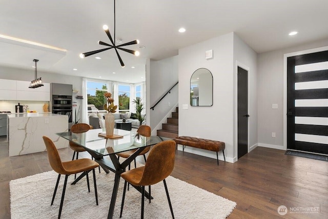 dining space with wood finished floors, stairway, recessed lighting, and baseboards