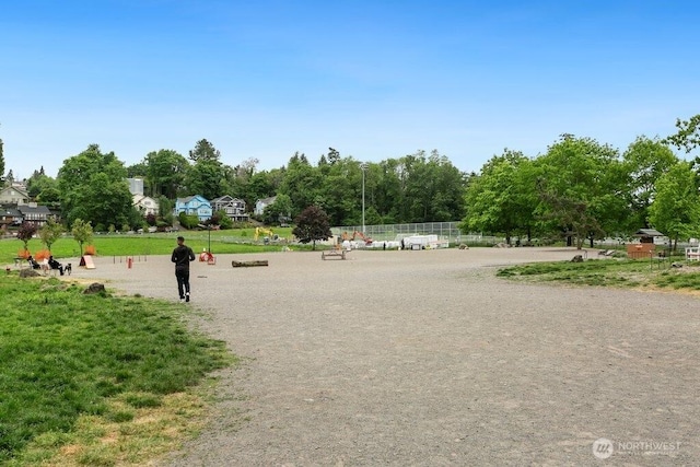 surrounding community featuring fence