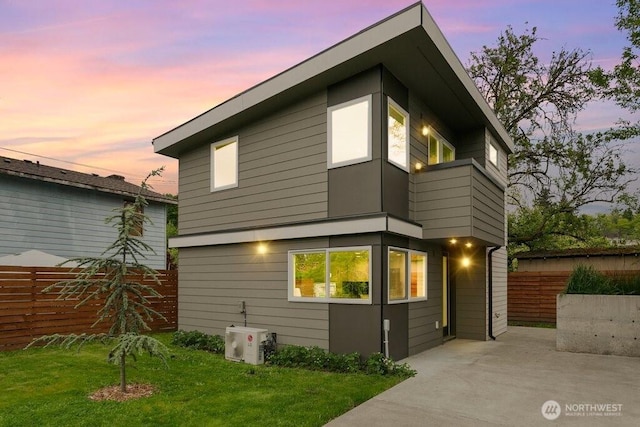 rear view of house with a patio and a cooling unit