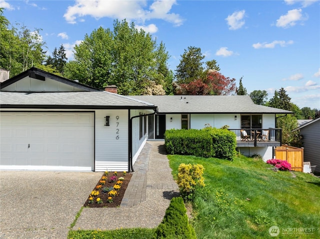 ranch-style home with an attached garage, asphalt driveway, a front lawn, a chimney, and roof with shingles