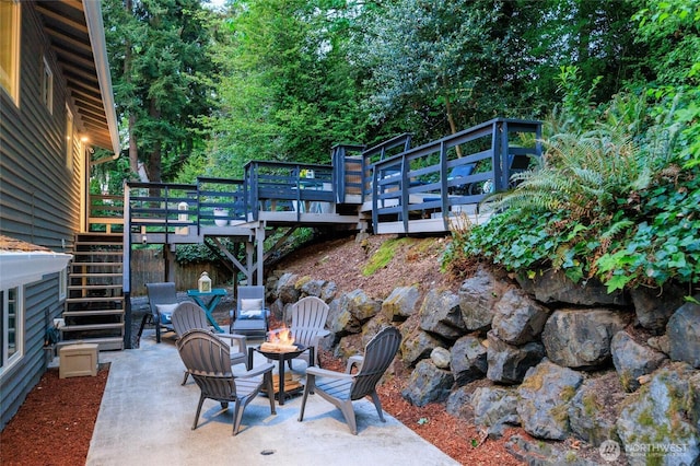 24222 92nd Ave W, Edmonds, WA 98020 - view of patio with stairs, a fire pit, and a deck