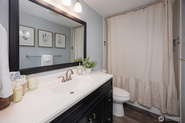 24222 92nd Ave W, Edmonds, WA 98020 - full bathroom featuring toilet, wood finished floors, and vanity