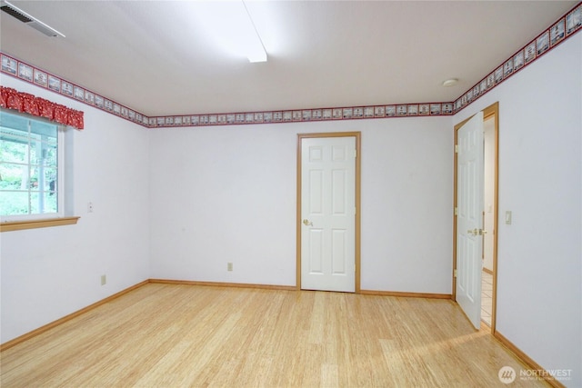 362 N Sunrise Blvd, Camano Island, WA 98282 - unfurnished room with wood finished floors and baseboards