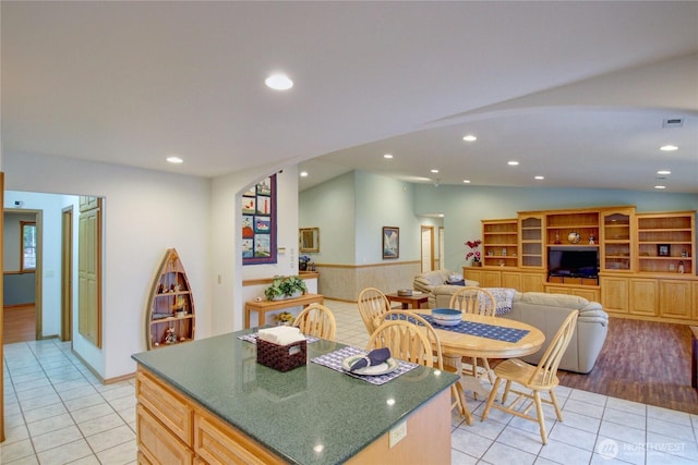 362 N Sunrise Blvd, Camano Island, WA 98282 - kitchen with light tile patterned flooring, lofted ceiling, a kitchen island, recessed lighting, and open floor plan