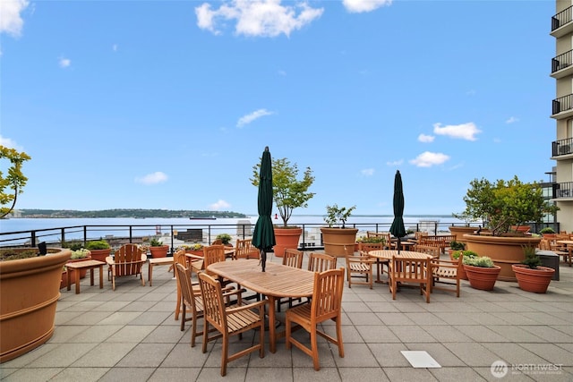 2607 Western Ave Unit 202, Seattle, WA 98121 - view of patio featuring a water view