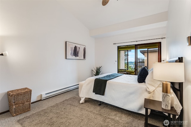 135 N 46th St Unit 402, Seattle, WA 98103 - bedroom with a baseboard heating unit, lofted ceiling, and carpet flooring