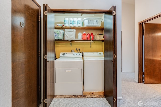 135 N 46th St Unit 402, Seattle, WA 98103 - laundry room with washer and clothes dryer and carpet flooring