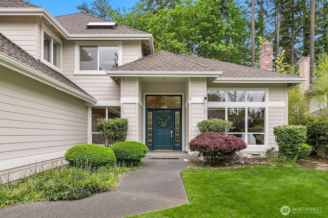23322 SE 26th Pl, Sammamish, WA 98075 - property entrance with a chimney, a yard, and roof with shingles