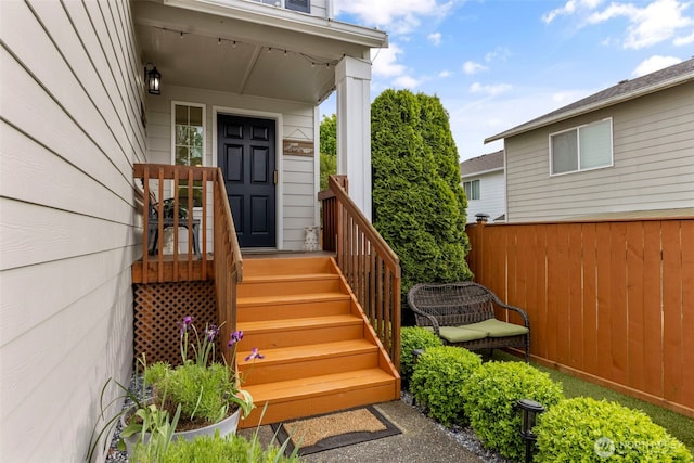 property entrance featuring fence