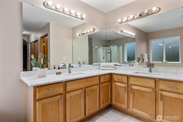 full bathroom featuring a stall shower and double vanity
