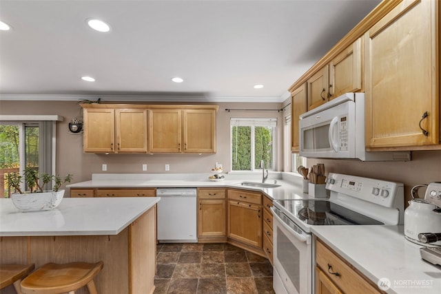 kitchen with white appliances, a sink, plenty of natural light, crown molding, and light countertops