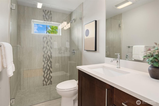 815 33rd Ave S, Seattle, WA 98144 - bathroom with a tile shower, toilet, and vanity