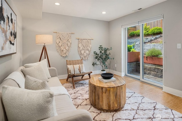 815 33rd Ave S, Seattle, WA 98144 - living room featuring light wood finished floors, recessed lighting, and baseboards