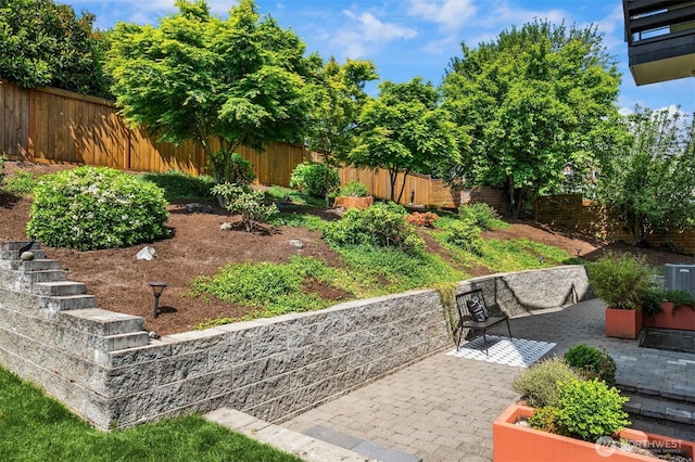 815 33rd Ave S, Seattle, WA 98144 - fenced backyard with a patio area