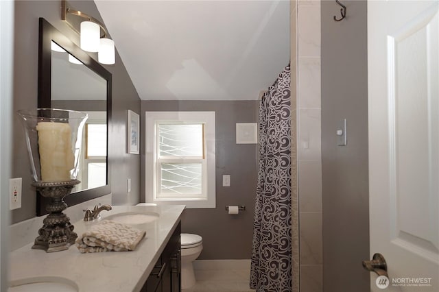 19828 104th Ave SE, Renton, WA 98055 - bathroom with vaulted ceiling, toilet, double vanity, curtained shower, and baseboards