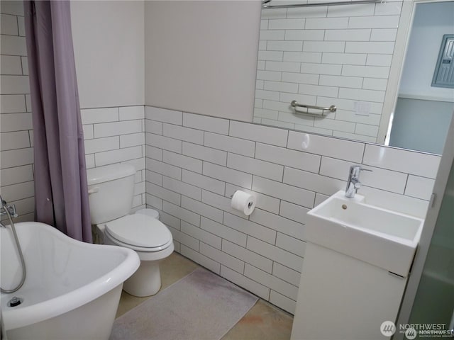 full bath with tile walls, a bath, toilet, tile patterned flooring, and a shower with shower curtain