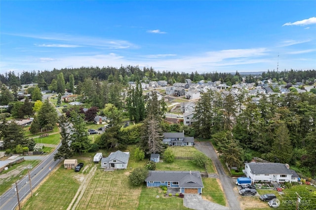 aerial overview of property's location featuring nearby suburban area