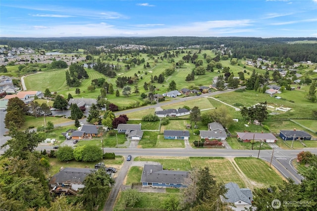 aerial view of property's location featuring nearby suburban area
