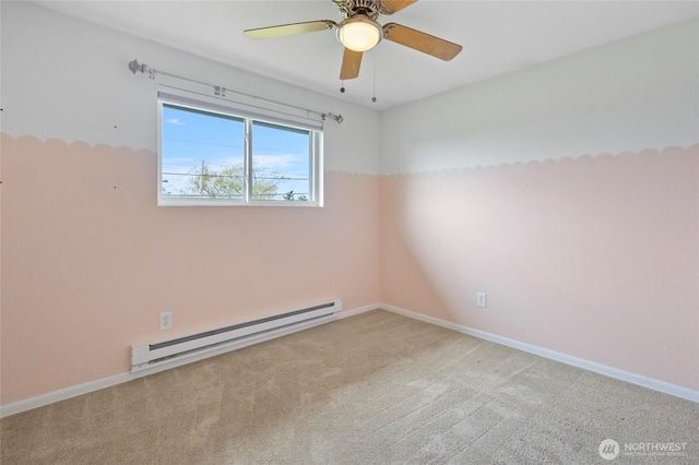 unfurnished room featuring a baseboard heating unit, carpet floors, ceiling fan, and baseboards