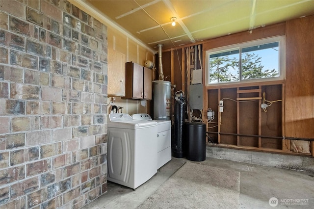 laundry room with washer and dryer, gas water heater, and cabinet space