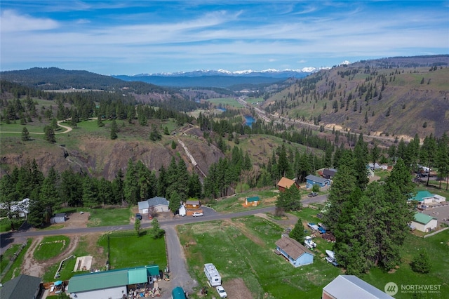 490 Morrison Canyon Ln, Cle Elum, WA 98922 - aerial overview of property's location with a mountain backdrop and a heavily wooded area