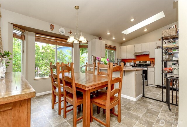 103 Schmid St, Enumclaw, WA 98022 - dining room featuring vaulted ceiling, a skylight, light tile patterned floors, a chandelier, and recessed lighting