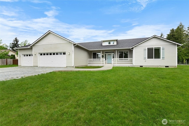 12921 224th St E, Graham, WA 98338 - view of front facade with covered porch, driveway, an attached garage, crawl space, and a shingled roof