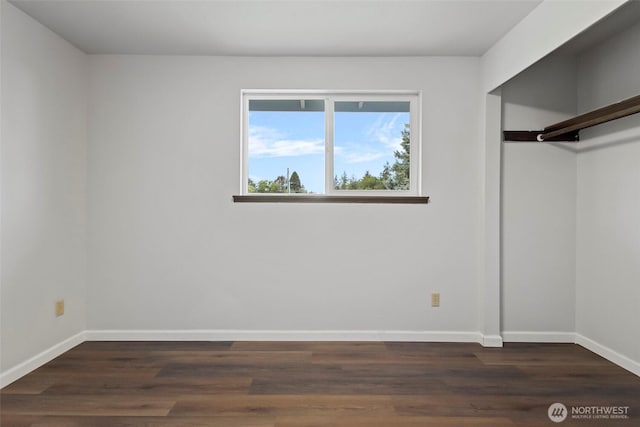 3812 R Ave, Anacortes, WA 98221 - unfurnished bedroom with dark wood-style flooring, baseboards, and a closet