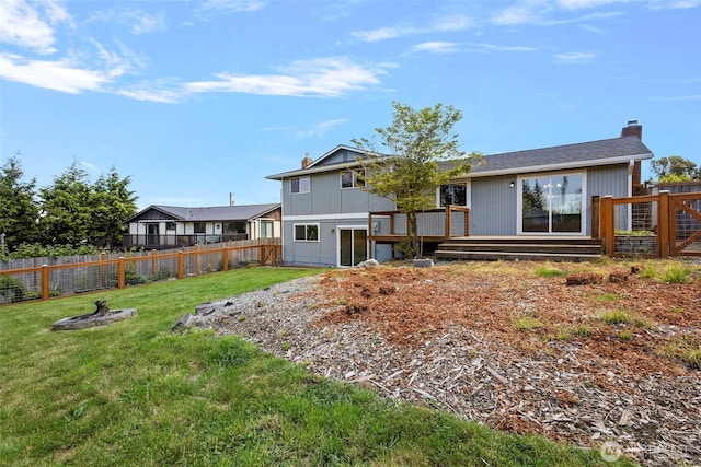 3812 R Ave, Anacortes, WA 98221 - rear view of house with a chimney and a deck