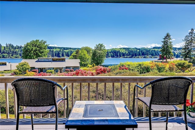 10 Olympic Pl Unit 10, Port Ludlow, WA 98365 - balcony with a view of trees and a water view